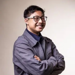 Profile picture of an Asian man in a denmi shirit.